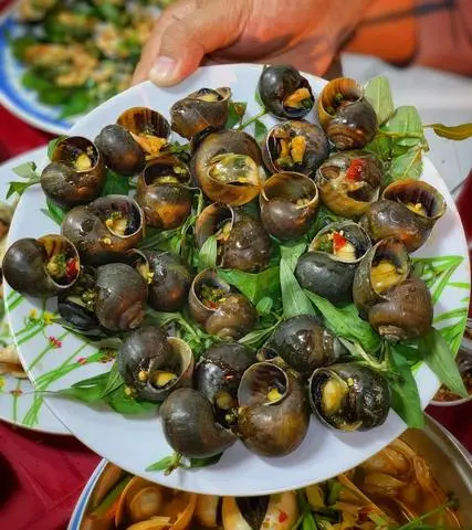 Hình ảnh Ốc bươu nướng tiêu xanh