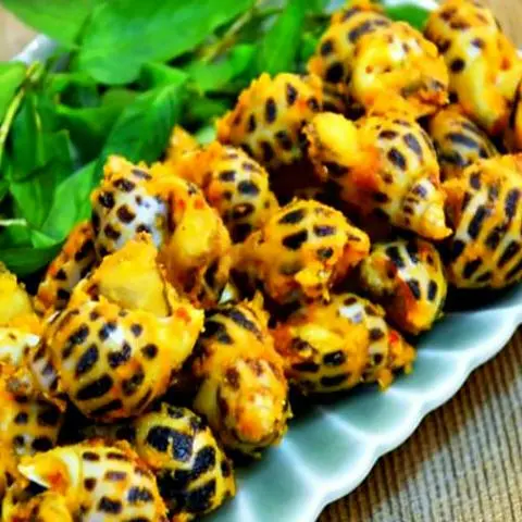 Hình ảnh Ốc Hương Xào Bơ Cay