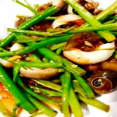 Hình ảnh Ốc Mỡ Xào Rau Muống