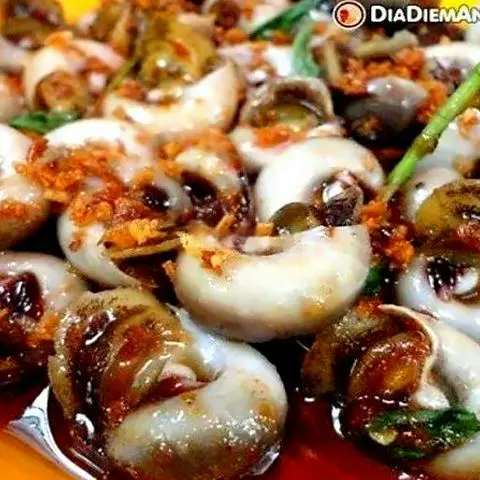 Hình ảnh Ốc Mỡ Xào Me