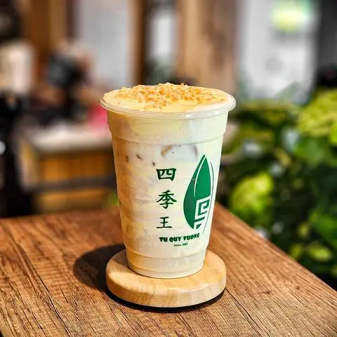 Hình ảnh Trà Sữa Kem Trứng Vụn Dừa Tứ Quý Vương