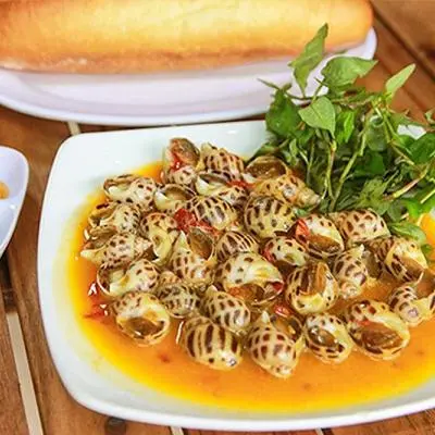 Hình ảnh Ốc Hương Xào Bơ Cay