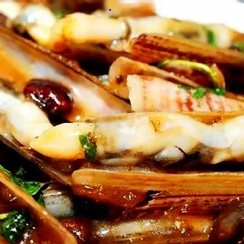 Hình ảnh Ốc móng tay xào me