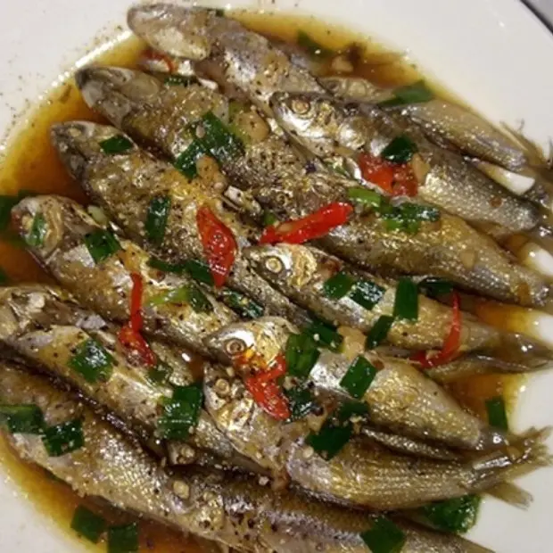 Hình ảnh Tai heo phá lấu cải chua