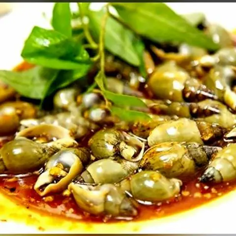 Hình ảnh Ốc Cà Na Xào Bơ Cay