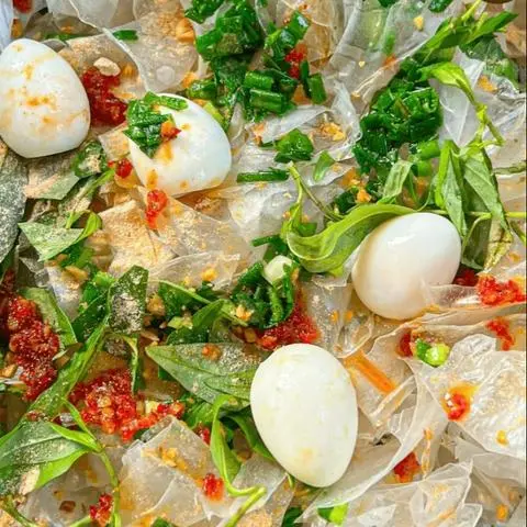 Hình ảnh Bánh Tráng Trộn Mỡ Hành 4 Trứng Cút Lòng Đào 
