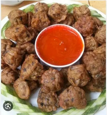 Hình ảnh Ốc nhồi cá ba sa 1 cây 3 viên