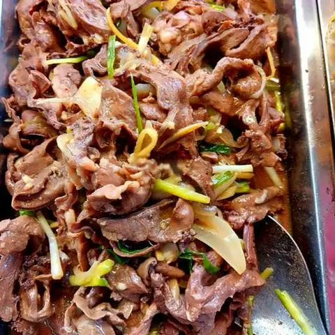 Hình ảnh Cơm tim heo xào hành gừng