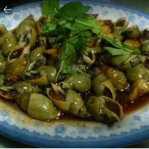 Hình ảnh Ốc cà na xào me