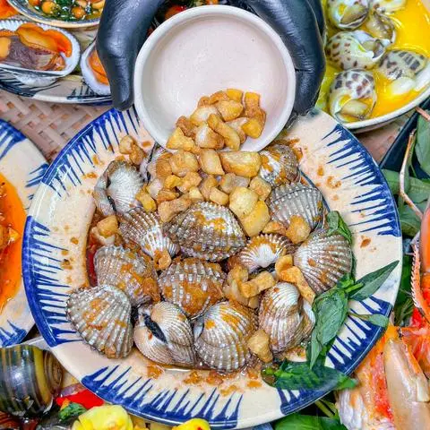 Hình ảnh Sò huyết tóp mỡ giòn