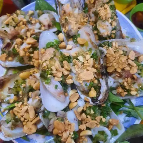 Hình ảnh Tu hài nướng mỡ hành (1 con)