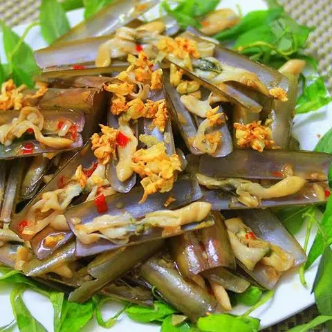 Hình ảnh Ốc móng tay cháy tỏi