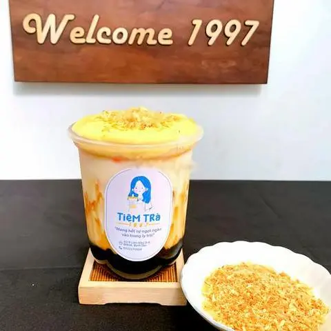 Hình ảnh Sữa tươi trân châu đường đen kem trứng vụn dừa