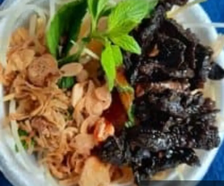 Hình ảnh gỏi đu  đủ khô bò đen