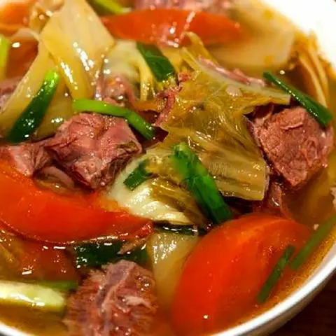 Hình ảnh Canh cải chua sườn non