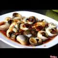 Hình ảnh Ốc Mỡ Xào Me