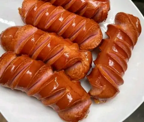 Hình ảnh Xúc xích CP chiên 1 cây