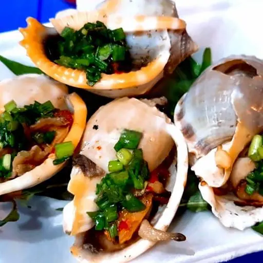 Hình ảnh Ốc tỏi nướng mắm hành