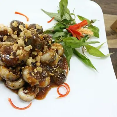 Hình ảnh Ốc Mỡ Xào Me.