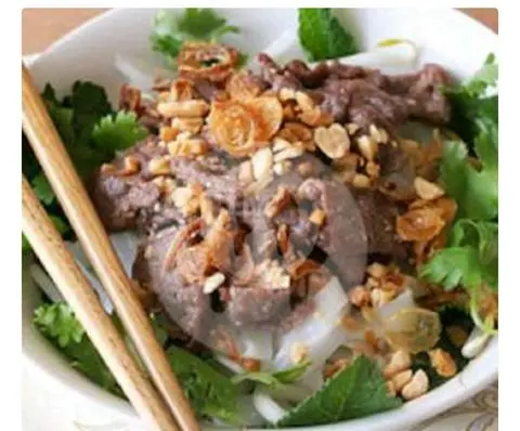 Hình ảnh Phở trộn sợi khô trứng lòng đào - thịt heo