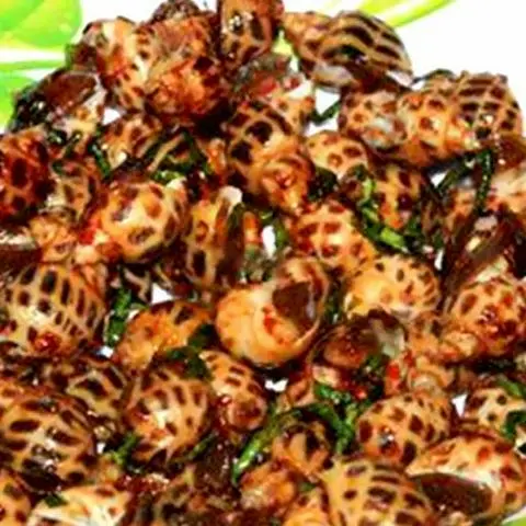 Hình ảnh Ốc hương xào me