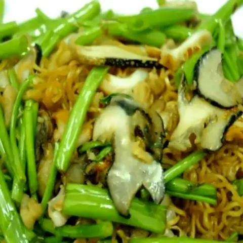 Hình ảnh Ốc giác xào rau muống