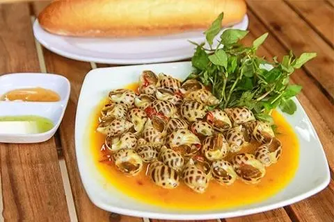 Hình ảnh Ốc hương xào bơ tỏi 