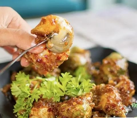 Hình ảnh Ốc bulot xào bơ tỏi