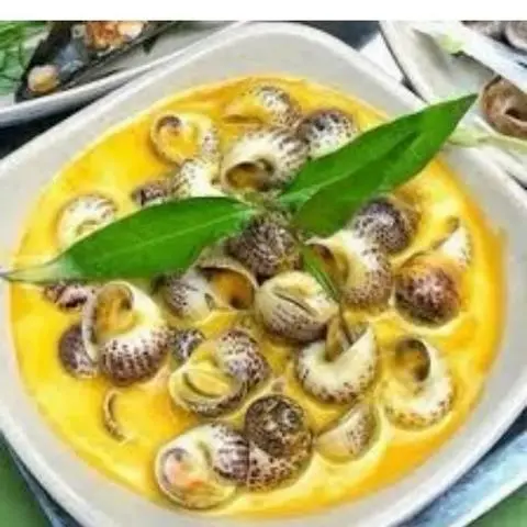 Hình ảnh Ốc mỡ sốt trứng muối