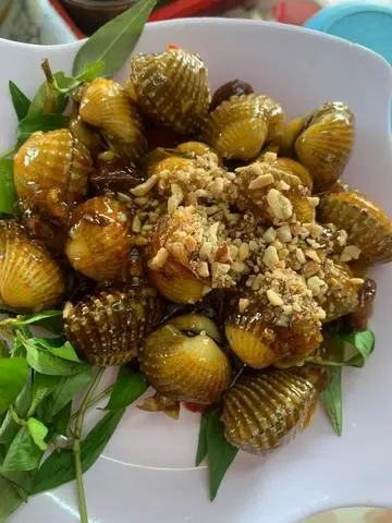 Hình ảnh sò huyết rang me