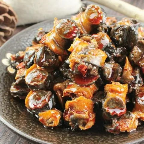 Hình ảnh Ốc gai xào me