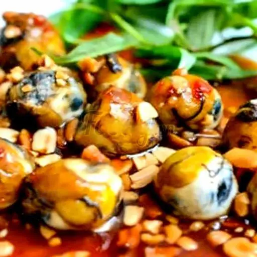 Hình ảnh Cút lộn xào me