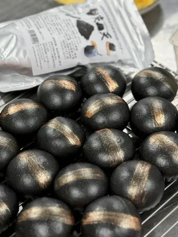 Hình ảnh Bánh bao hắc kim sa