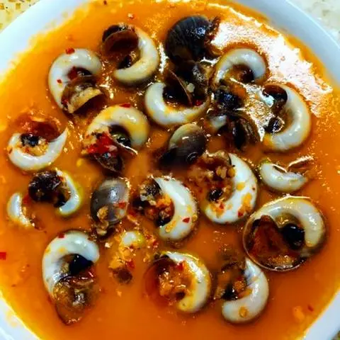 Hình ảnh Ốc mỡ xào bơ cay