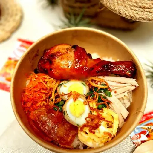 Hình ảnh Xôi thập cẩm đùi gà roti nướng lớn