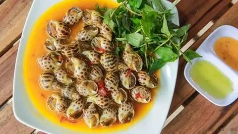 Hình ảnh Ốc hương xào bơ cay
