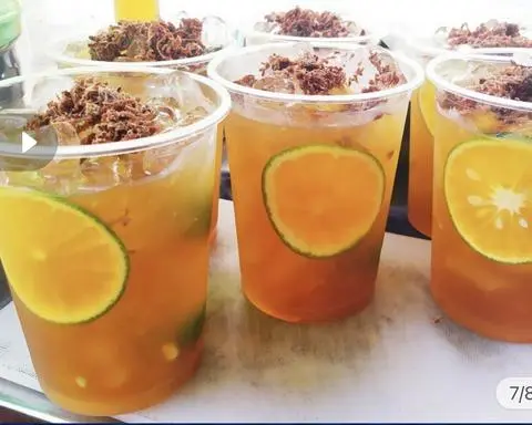 Hình ảnh trà tắc cam xí muội