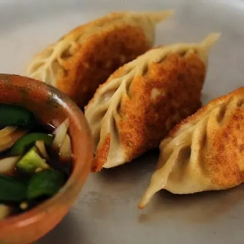 Hình ảnh Mandu chiên giòn nhân ú ụ
