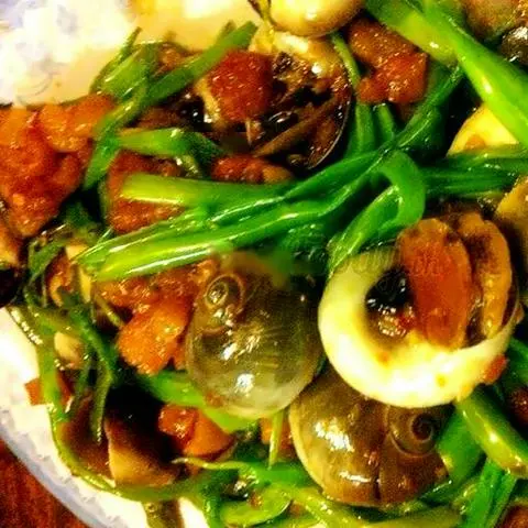 Hình ảnh Ốc mỡ xào rau muống