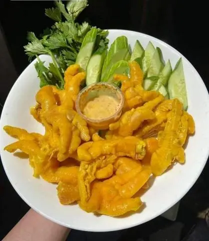 Hình ảnh Chân Gà Rút Xương Ủ Muối