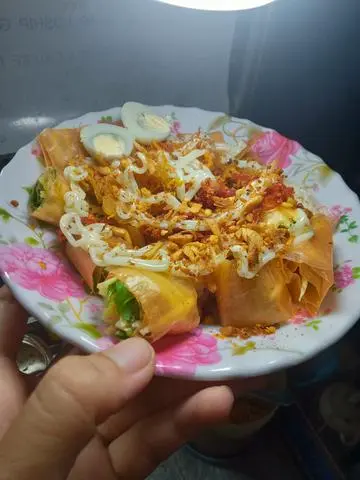 Hình ảnh Bánh tráng cuốn thập cẩm+ Hồng Trà tắc 