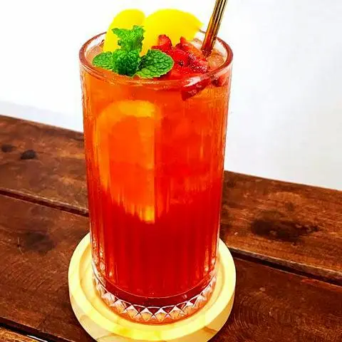 Hình ảnh Trà cam đào dâu tây