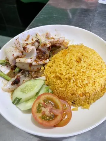 Hình ảnh Cơm mực xào sa tế