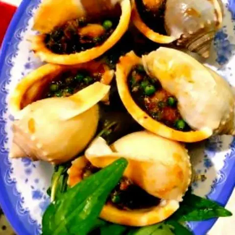 Hình ảnh Ốc tỏi nướng tiêu xanh