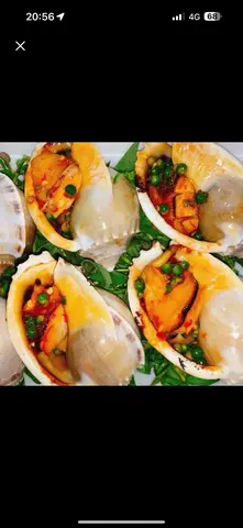 Hình ảnh Ốc Tỏi nướng tiêu xanh
