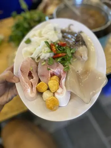 Hình ảnh Lẩu Mực - Cá Măng Chua 