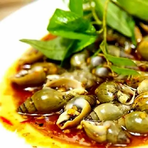 Hình ảnh Ốc Cà Na Xào Me