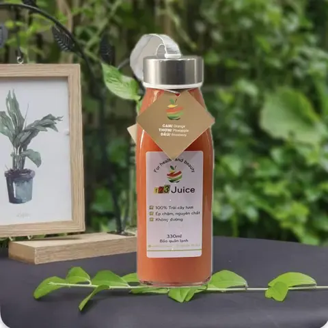 Hình ảnh Nước ép Cam - Thơm - Dâu 330ml (thủy tinh)