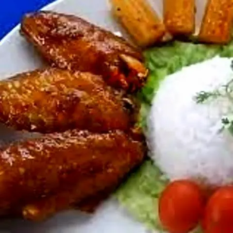 Hình ảnh Cơm cánh gà xối mỡ