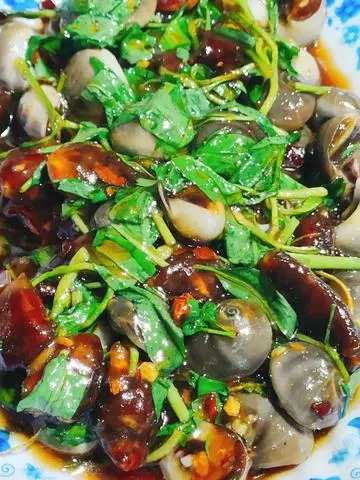Hình ảnh Ốc mỡ xào me 
